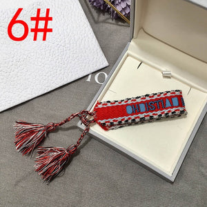 2019 Hot Fashion Multi-color Woven Stretch Hand Strap Cotton Embroidery Charm Letter Bracelet Woven Fringed Bracelet For Women