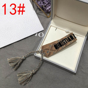 2019 Hot Fashion Multi-color Woven Stretch Hand Strap Cotton Embroidery Charm Letter Bracelet Woven Fringed Bracelet For Women