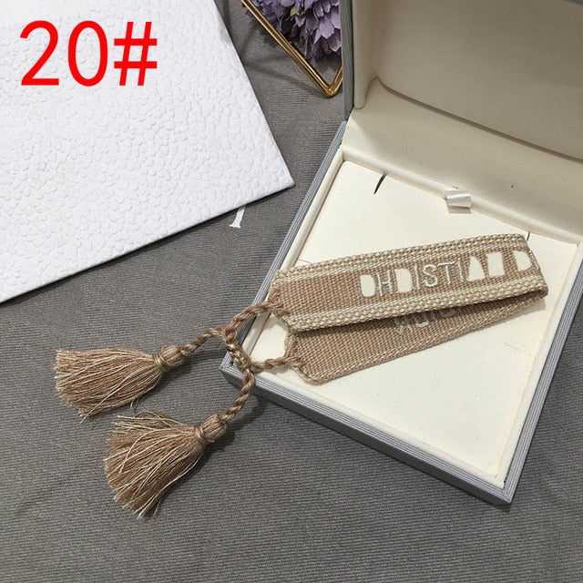 2019 Hot Fashion Multi-color Woven Stretch Hand Strap Cotton Embroidery Charm Letter Bracelet Woven Fringed Bracelet For Women