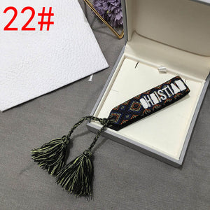 2019 Hot Fashion Multi-color Woven Stretch Hand Strap Cotton Embroidery Charm Letter Bracelet Woven Fringed Bracelet For Women