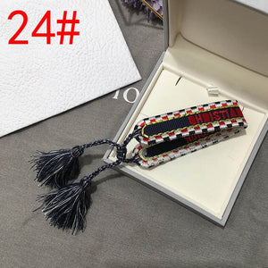 2019 Hot Fashion Multi-color Woven Stretch Hand Strap Cotton Embroidery Charm Letter Bracelet Woven Fringed Bracelet For Women