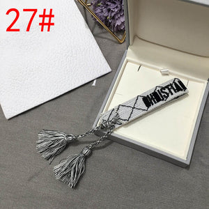 2019 Hot Fashion Multi-color Woven Stretch Hand Strap Cotton Embroidery Charm Letter Bracelet Woven Fringed Bracelet For Women