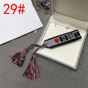 2019 Hot Fashion Multi-color Woven Stretch Hand Strap Cotton Embroidery Charm Letter Bracelet Woven Fringed Bracelet For Women